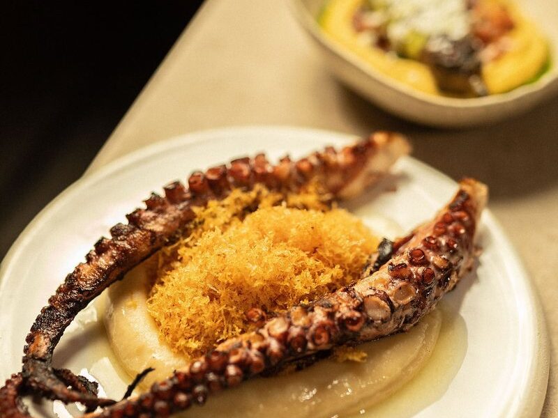 Aegean Ember Octopodi: charred octopus on celeriac purée with crisp potato