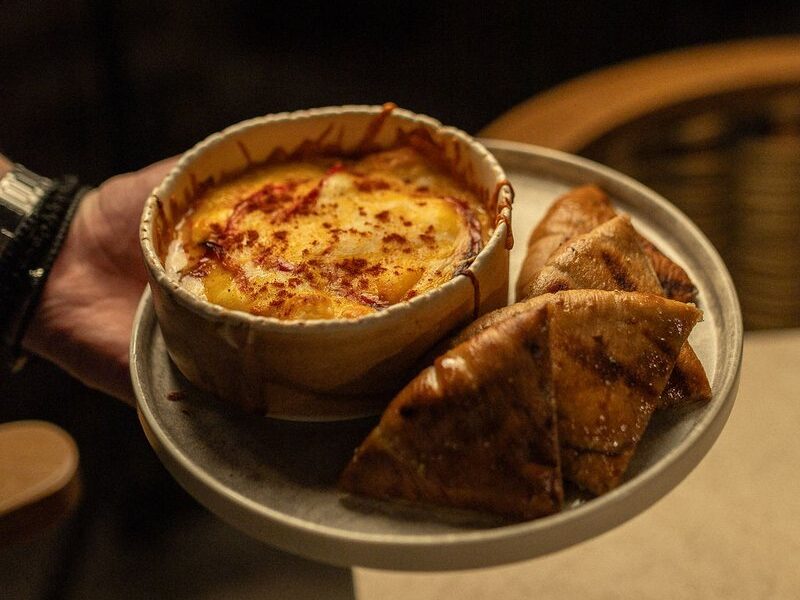 Baked Greek cheese with grilled pita